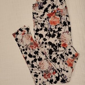 Lularoe womans TC2 leggings white background with black, purple,  pink and green